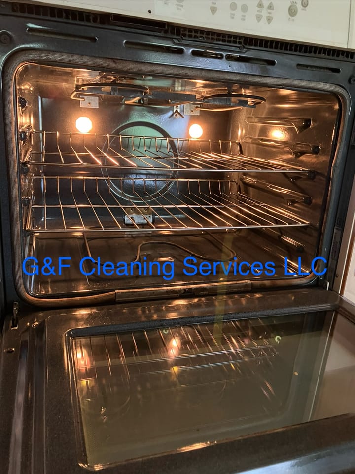 The inside of an oven after a deep clean, racks and glass spotless